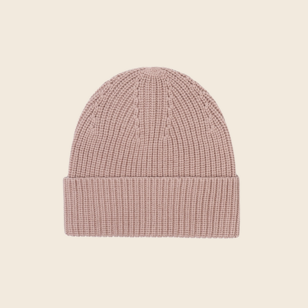 Beige beanie on a cream background