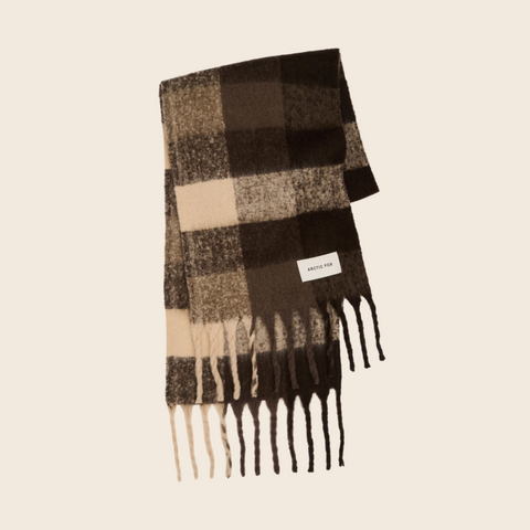 Brown plaid scarf with fringes on a beige background