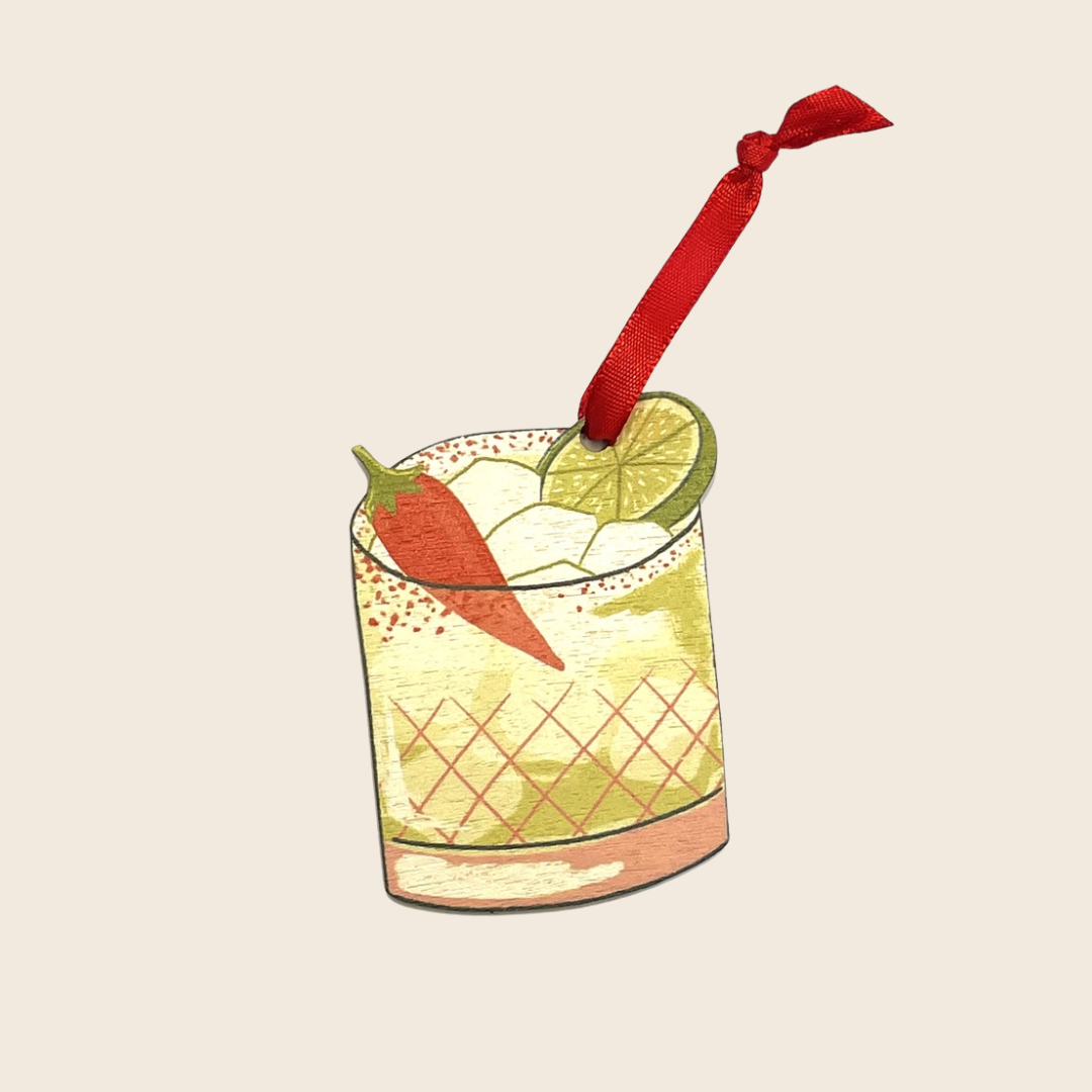 Illustration of a spicy marg cocktail with a red chilli and lime wedge on a beige background