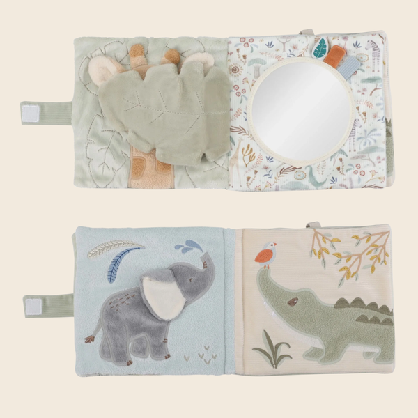 Two soft fabric baby activity books shown flat on a light beige background. The top book has a green plush tree, a giraffe, and a round mirror.