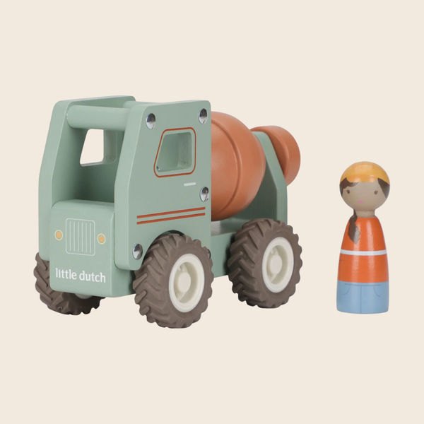 A wooden toy cement mixer truck in sage green and terracotta orange, shown next to a small wooden construction worker peg doll on a solid light beige background. The brand name 'little dutch' is printed on the side of the truck.